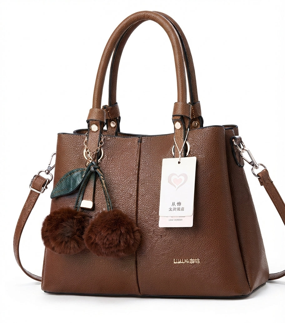 Premium Elegant Handbag with Playful Pom-Pom Charm